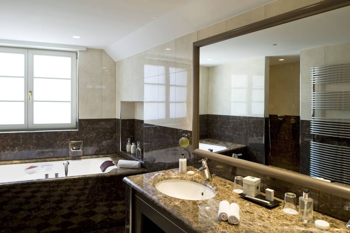 hair dryer, bathrobes, slippers, towels