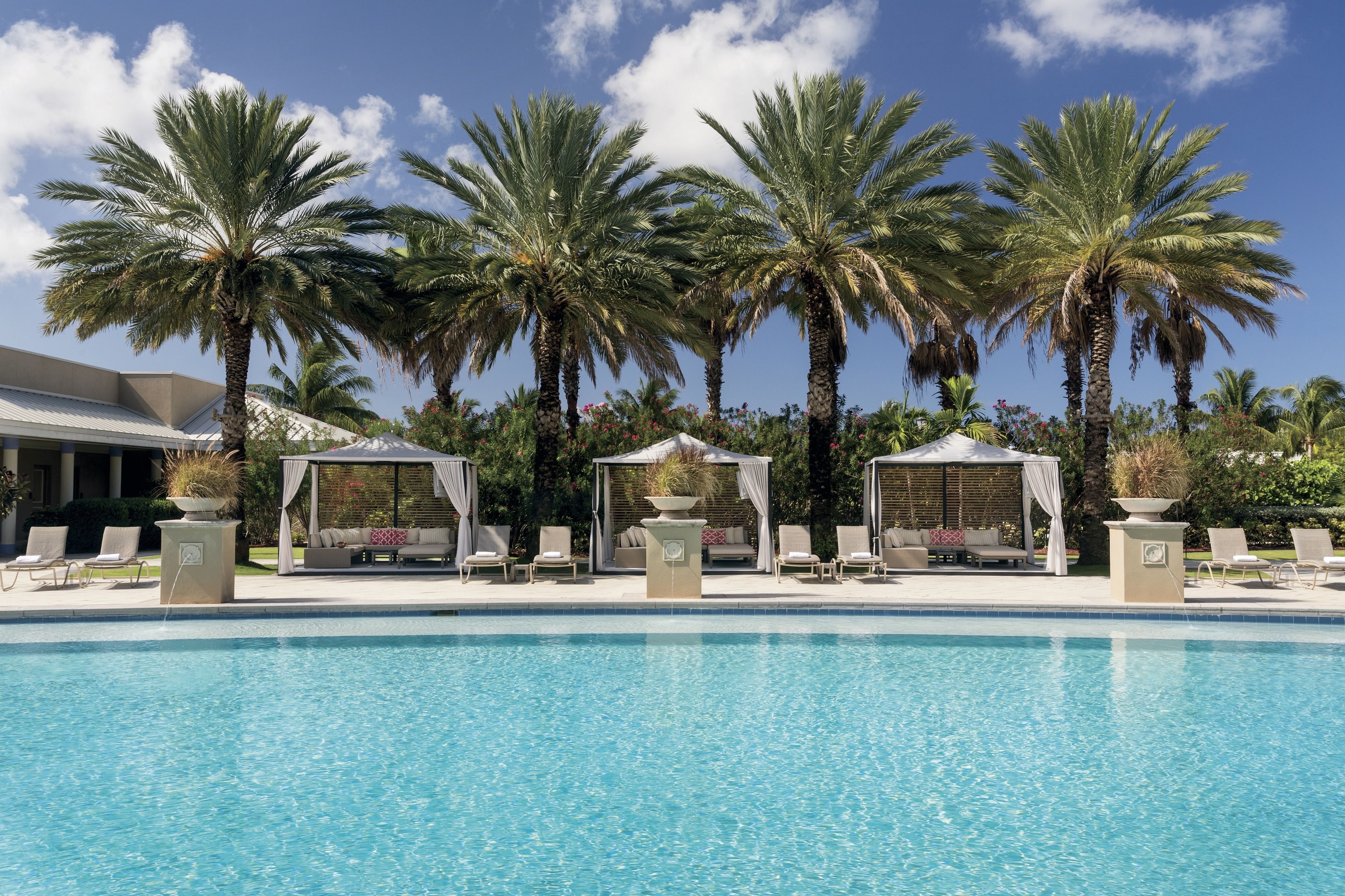 2 outdoor pools, pool umbrellas, pool loungers