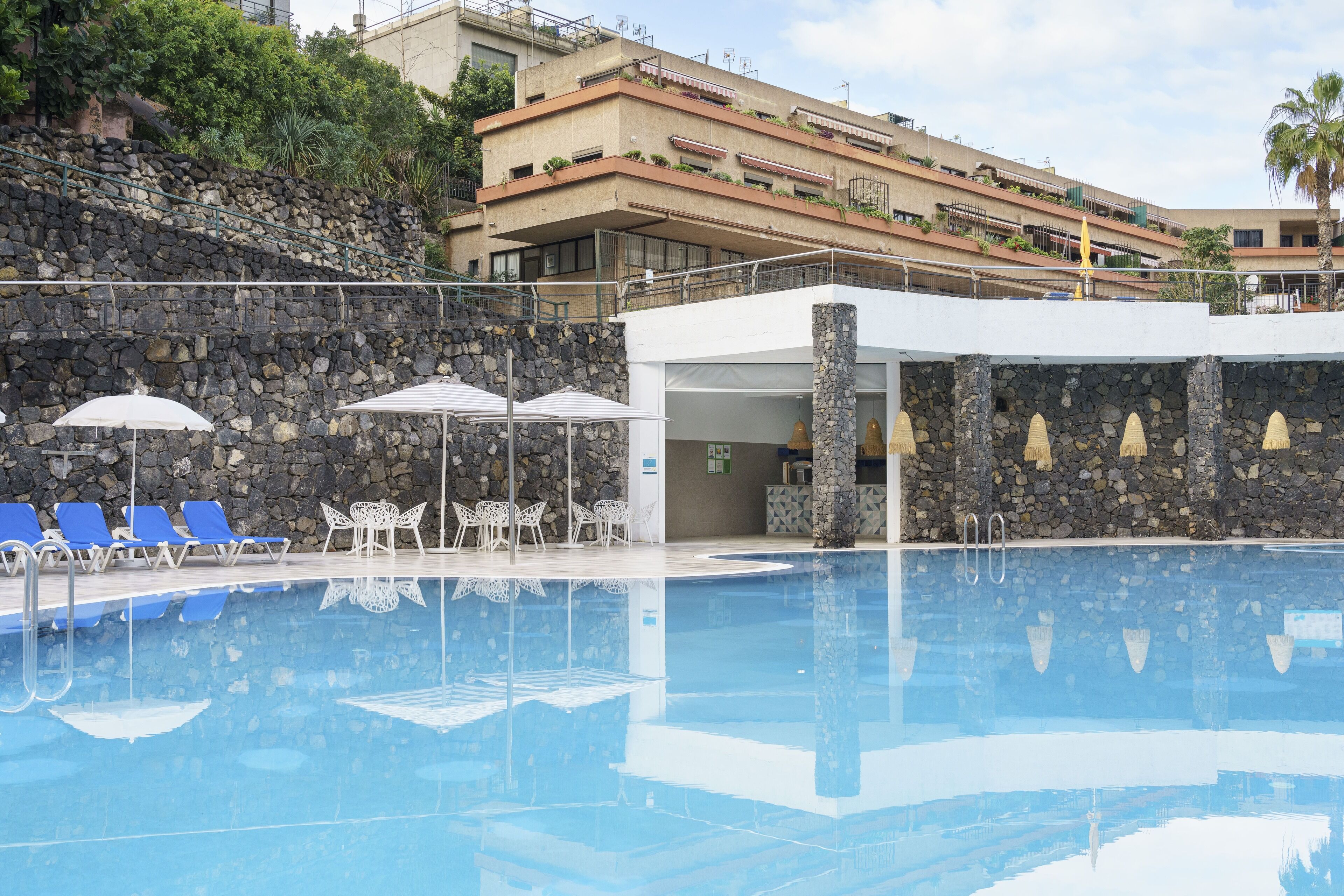 2 outdoor pools, pool umbrellas, sun loungers