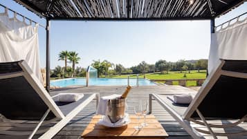Indoor pool, outdoor pool, open 7:30 AM to 9:00 PM, free cabanas