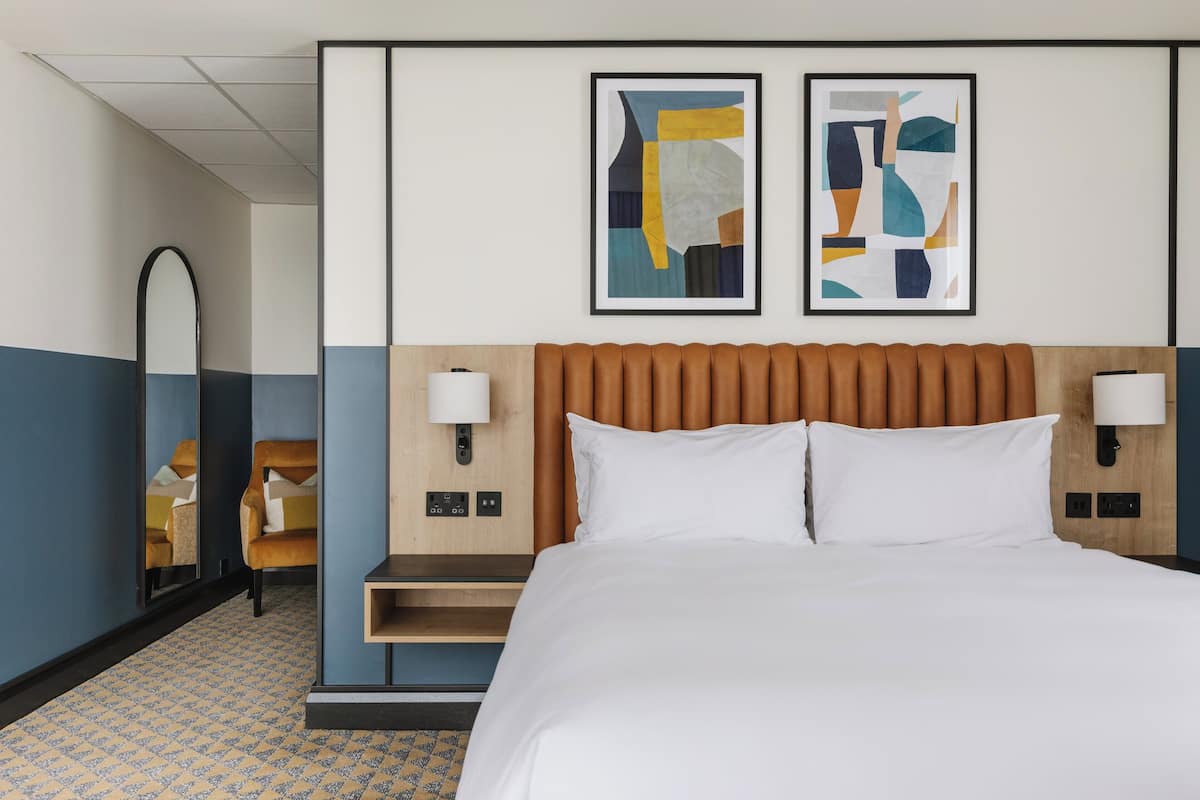 Suite, 1 King Bed | Premium bedding, in-room safe, individually decorated, desk