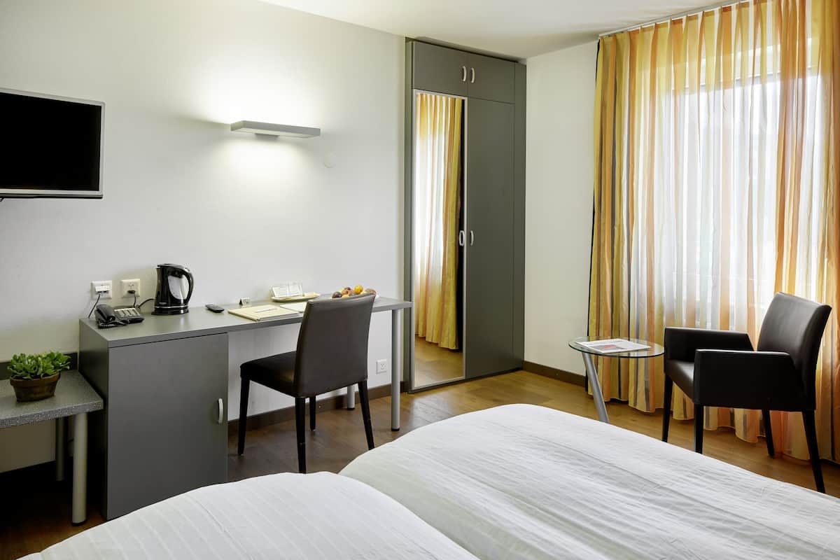 Premium-Doppel- oder -Zweibettzimmer | Wohnzimmer