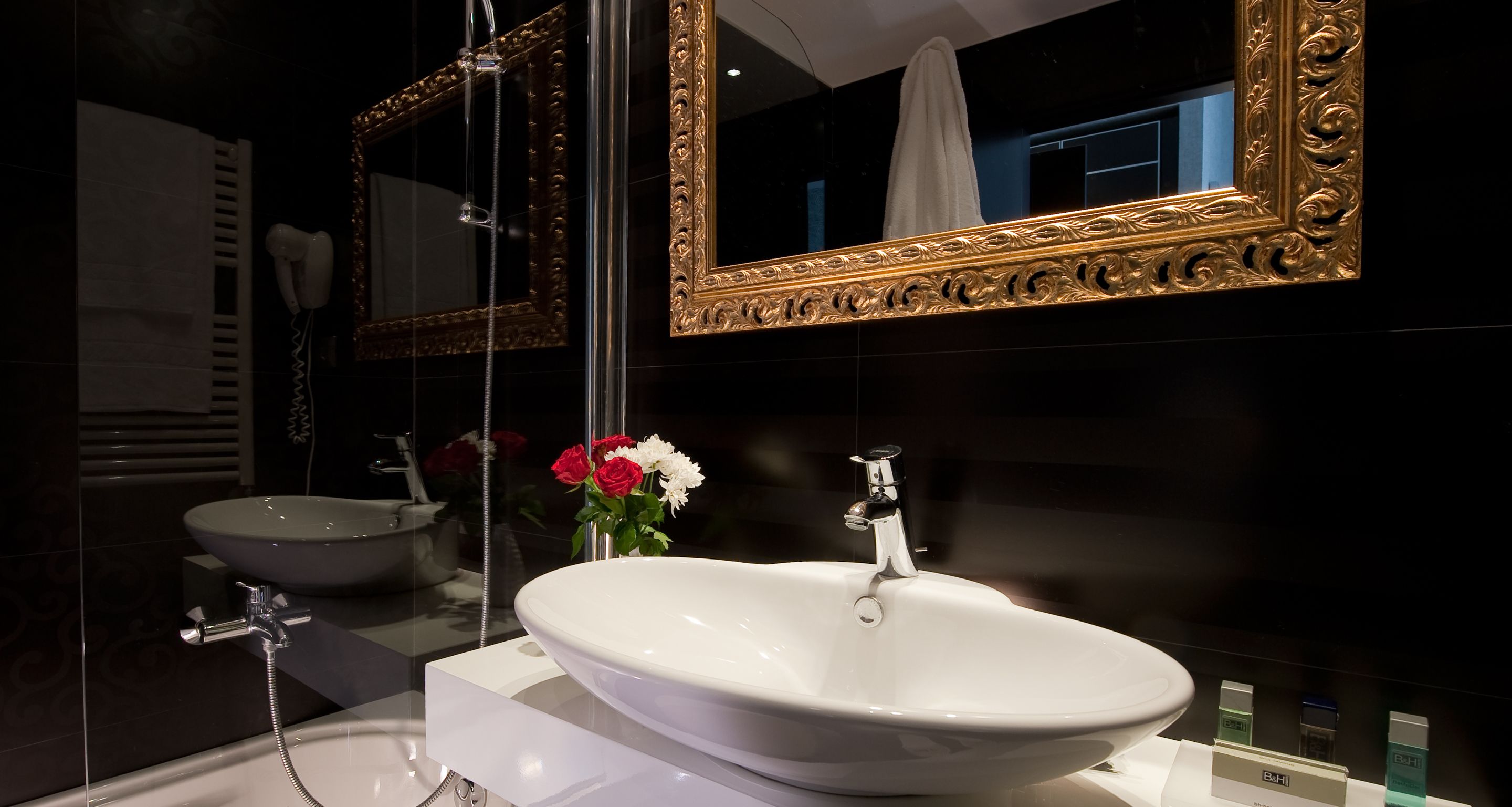 shower, hair dryer, bidet, towels