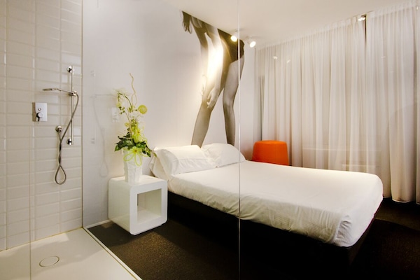 Deluxe Double Room, Garden Area | Minibar, in-room safe, desk, soundproofing