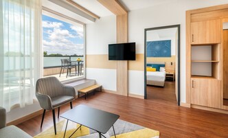 Apartment | Minibar, in-room safe, desk, laptop workspace