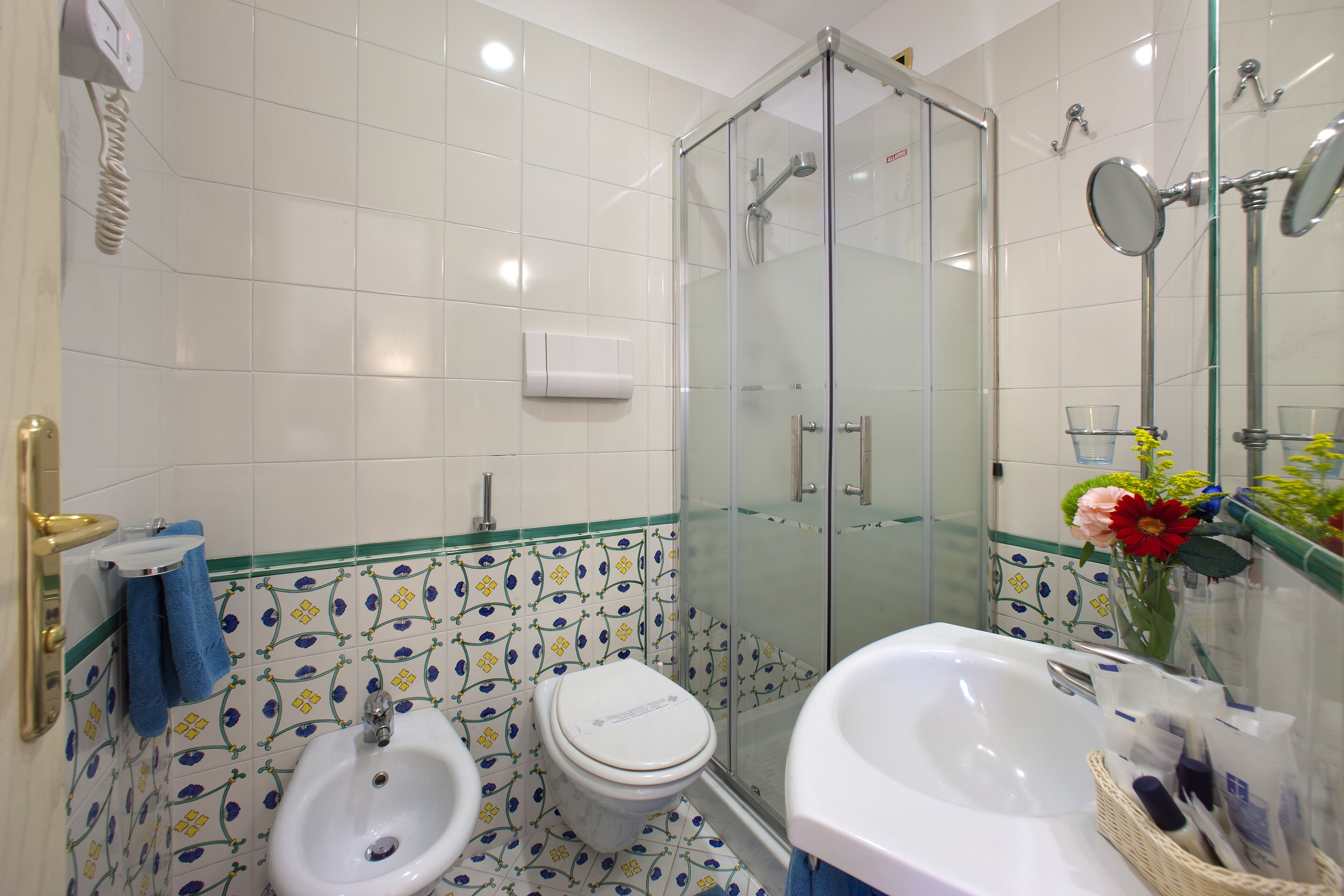 shower, free toiletries, hair dryer, towels