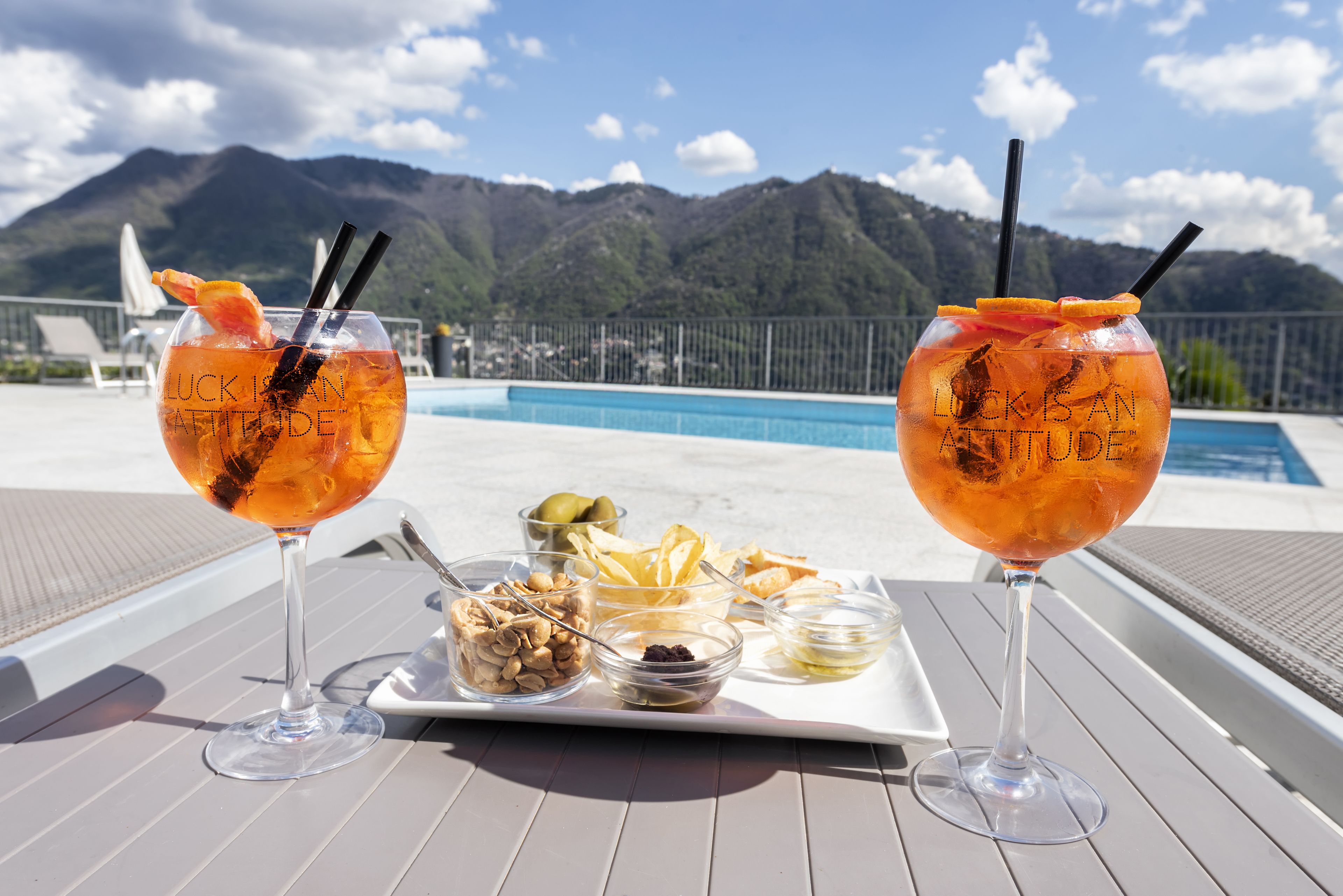 seasonal outdoor pool, pool umbrellas, pool loungers