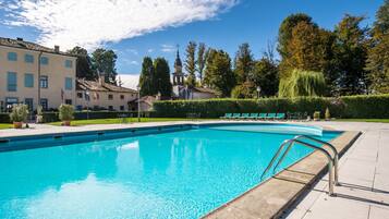 Outdoor pool, pool umbrellas, pool loungers