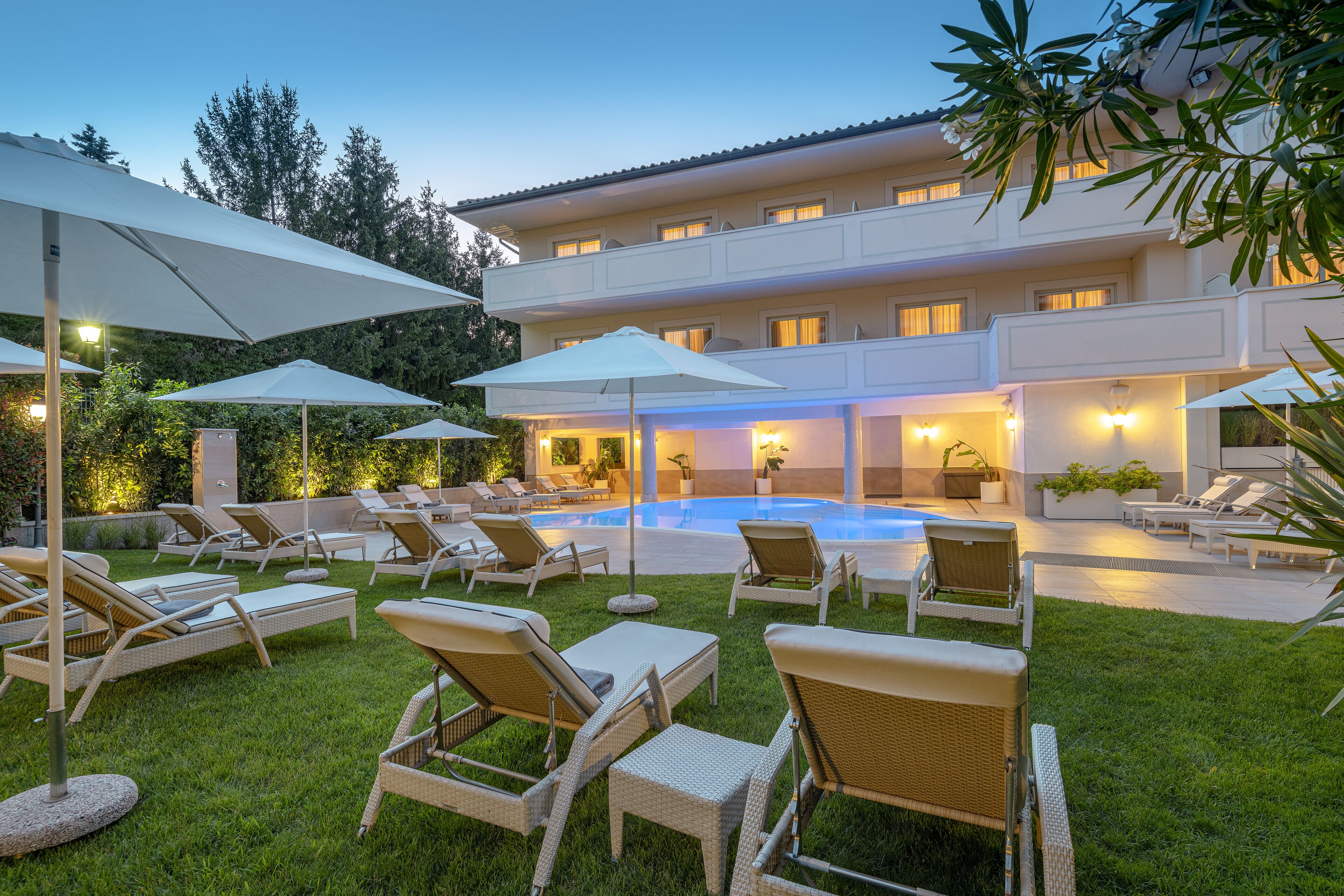 seasonal outdoor pool, open 9:00 am to 8:00 pm, pool umbrellas