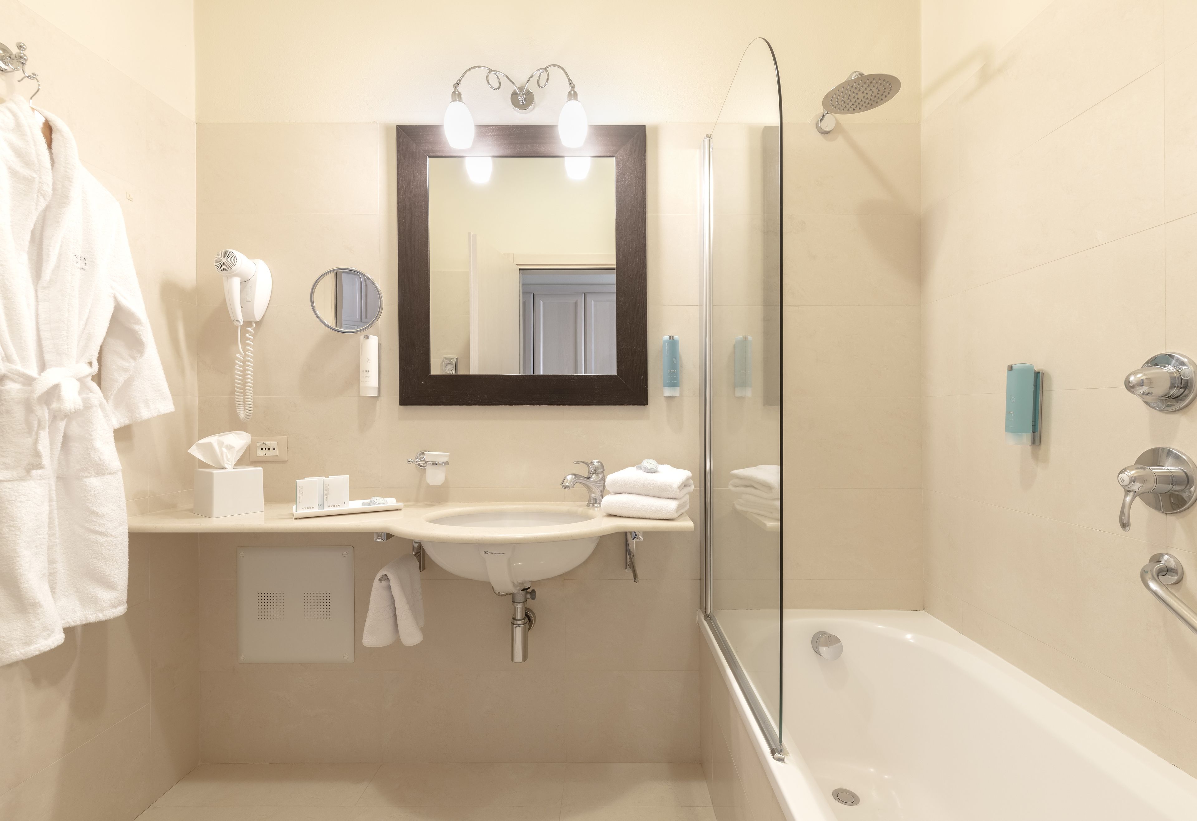 eco-friendly toiletries, hair dryer, bathrobes, slippers