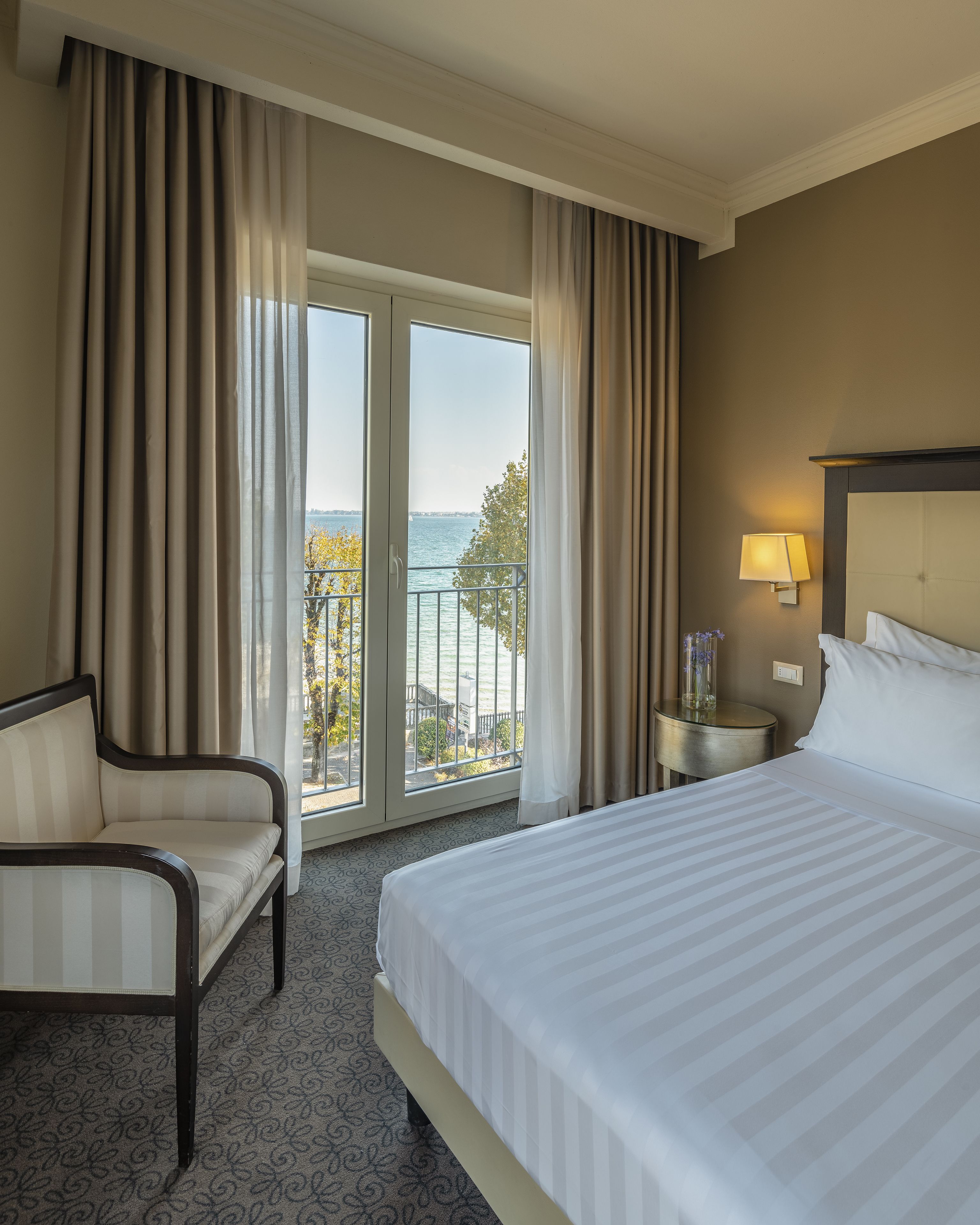 suite, balcony, lake view | 1 bedroom, premium bedding, down duvets, minibar