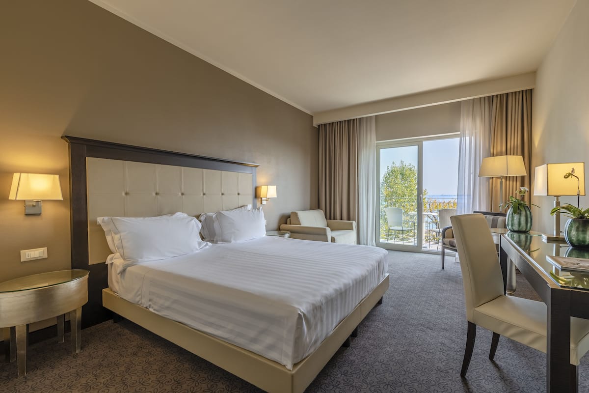 Junior Suite, Balcony, Lake View | Premium bedding, down comforters, minibar, in-room safe