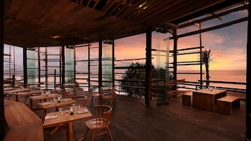 Breakfast, lunch, dinner served; beach views