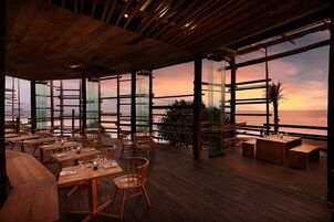 Breakfast, lunch, dinner served; beach views