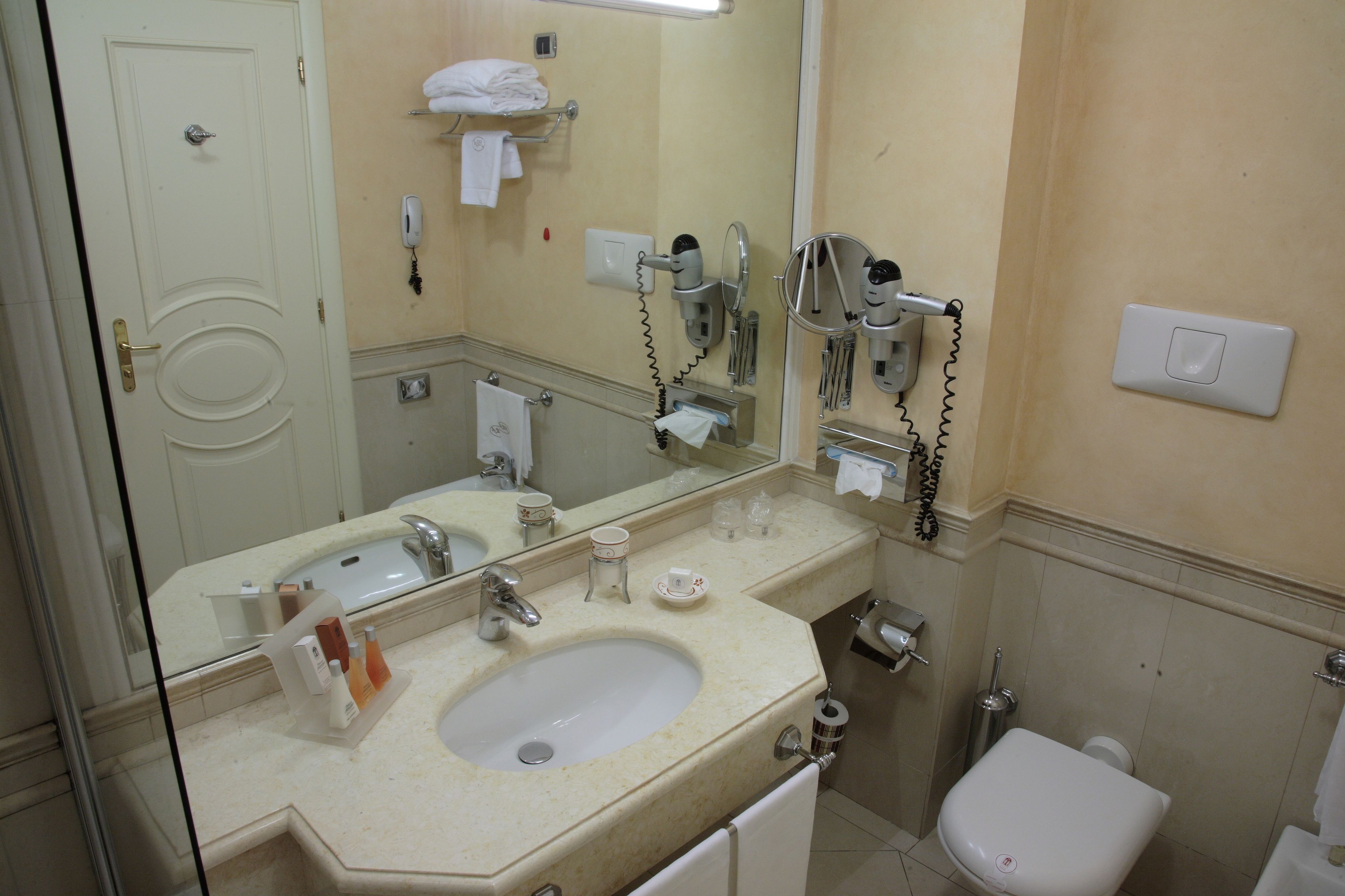 free toiletries, hair dryer, bidet, towels