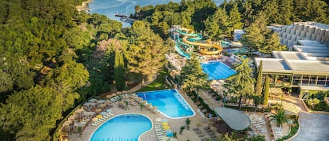 Indoor pool, seasonal outdoor pool, pool umbrellas, sun loungers