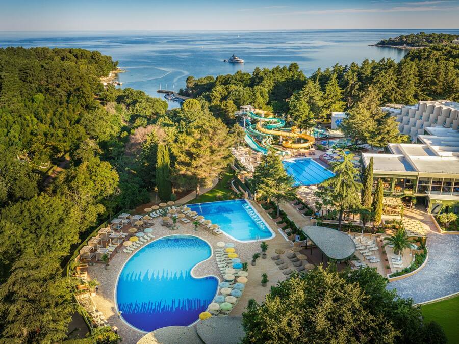 Indoor pool, seasonal outdoor pool, pool umbrellas, sun loungers