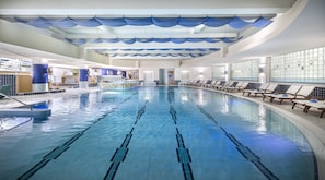Indoor pool, seasonal outdoor pool, pool umbrellas, pool loungers