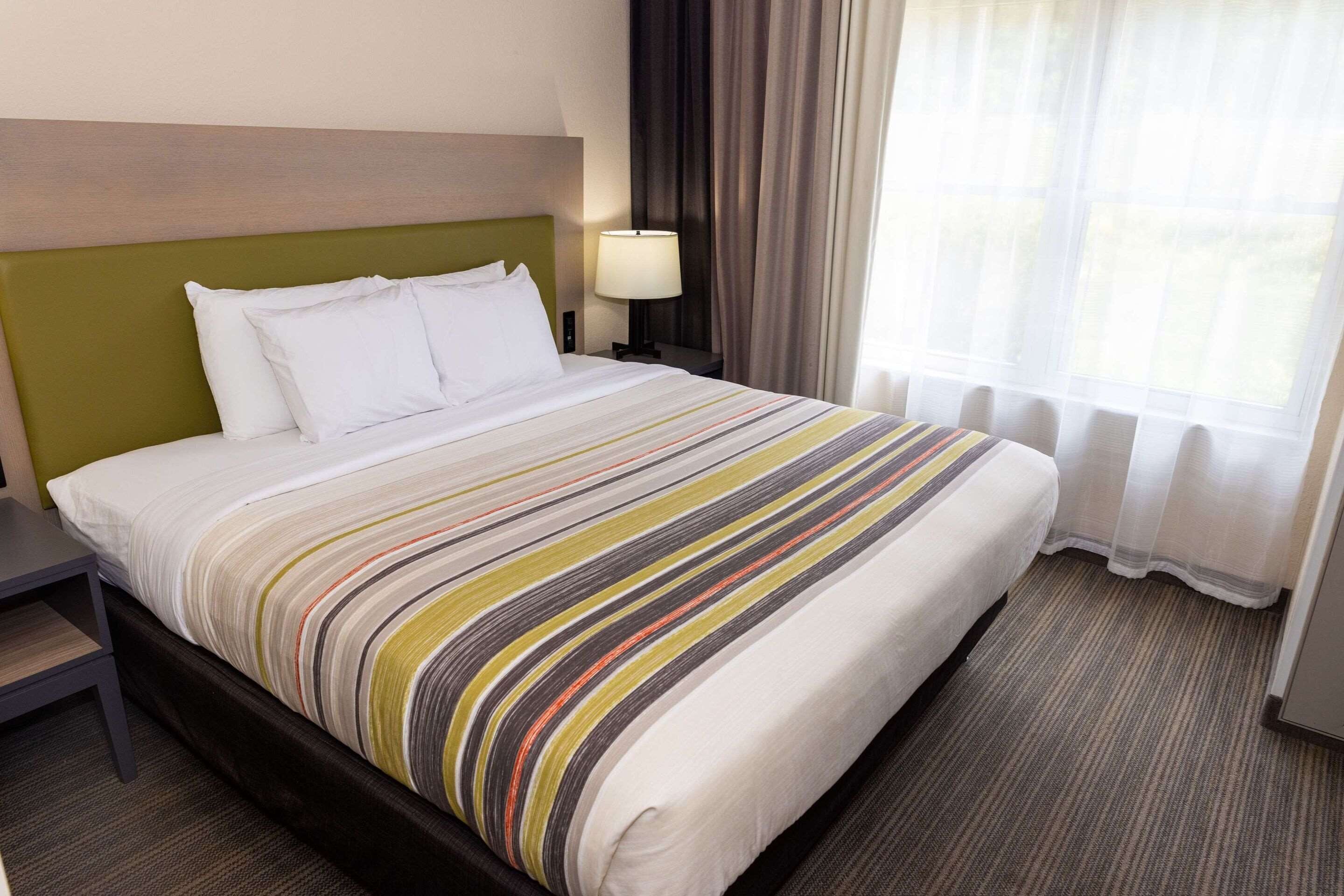 premium bedding, down duvets, in-room safe, desk