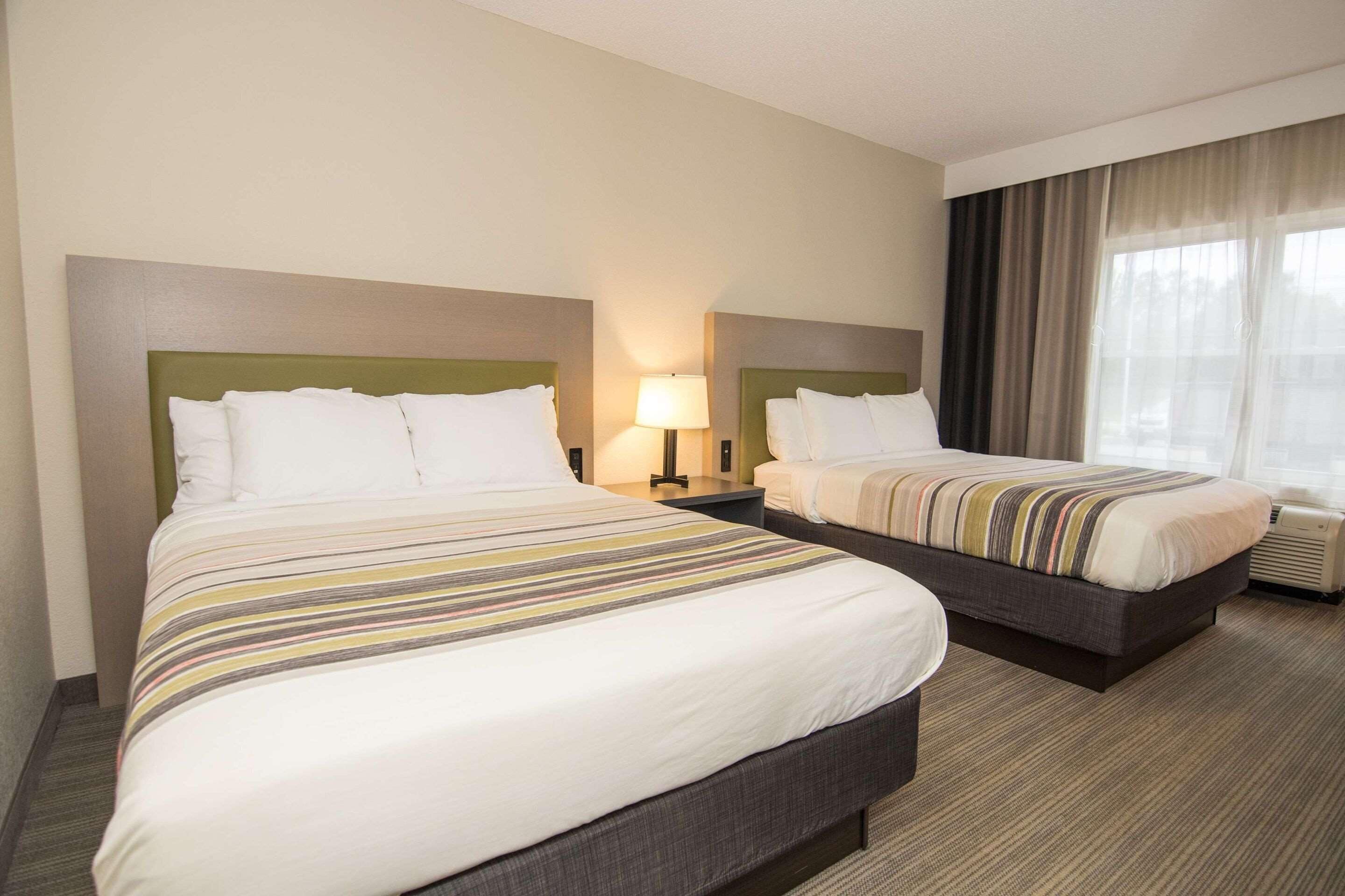 premium bedding, down duvets, in-room safe, desk