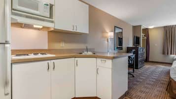 Fridge, microwave, stovetop, coffee/tea maker