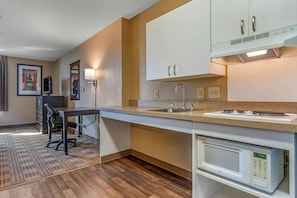 Fridge, microwave, stovetop, coffee/tea maker