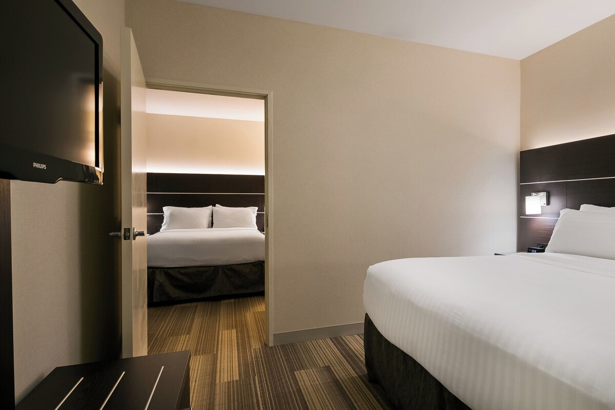 Suite, Multiple Beds, Mobility Accessible (Accessible Tub) | In-room safe, desk, laptop workspace, iron/ironing board