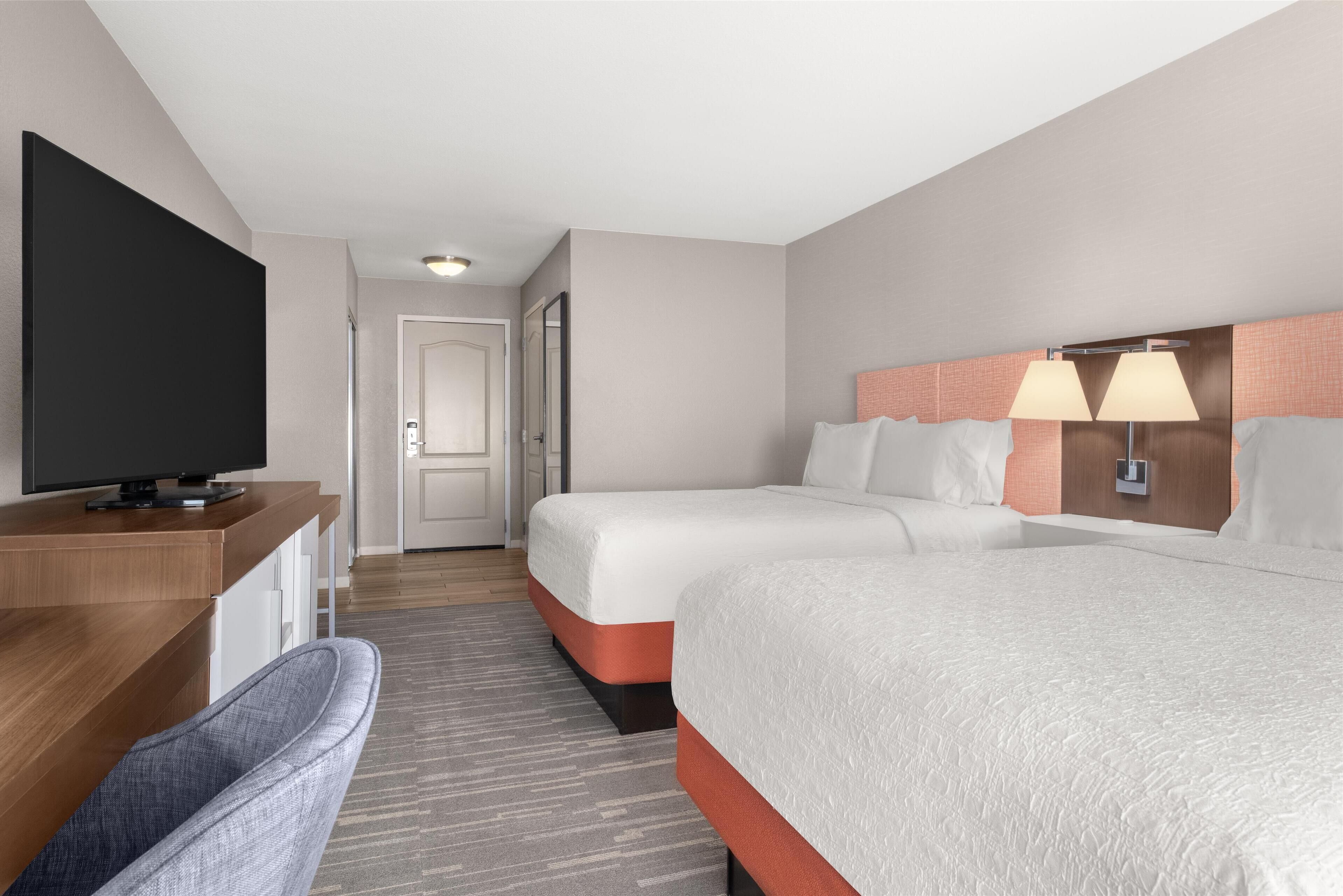 room, 2 queen beds, non smoking | premium bedding, select comfort beds, in-room safe, desk