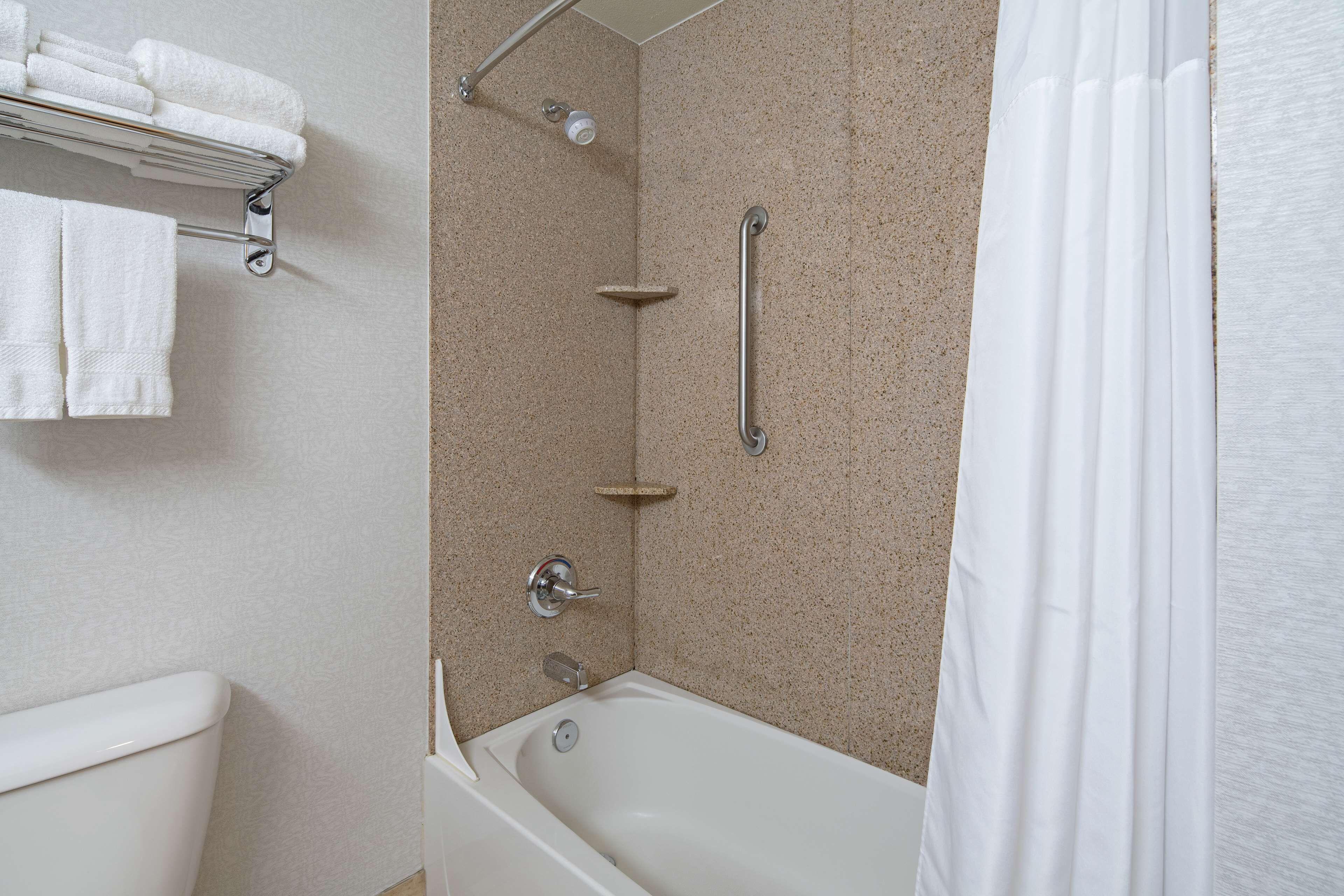 combined shower/bathtub, free toiletries, hair dryer, towels