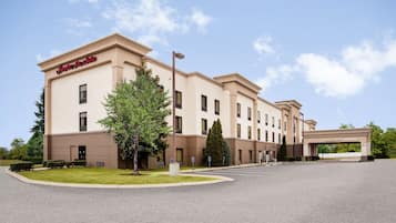 Stunning hotel building with a symmetrical facade and a welcoming atmosphere.