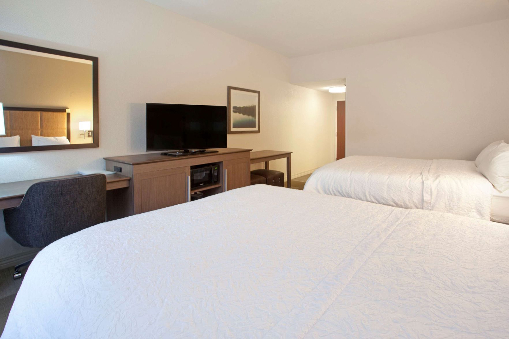 Pillowtop beds, blackout drapes, iron/ironing board