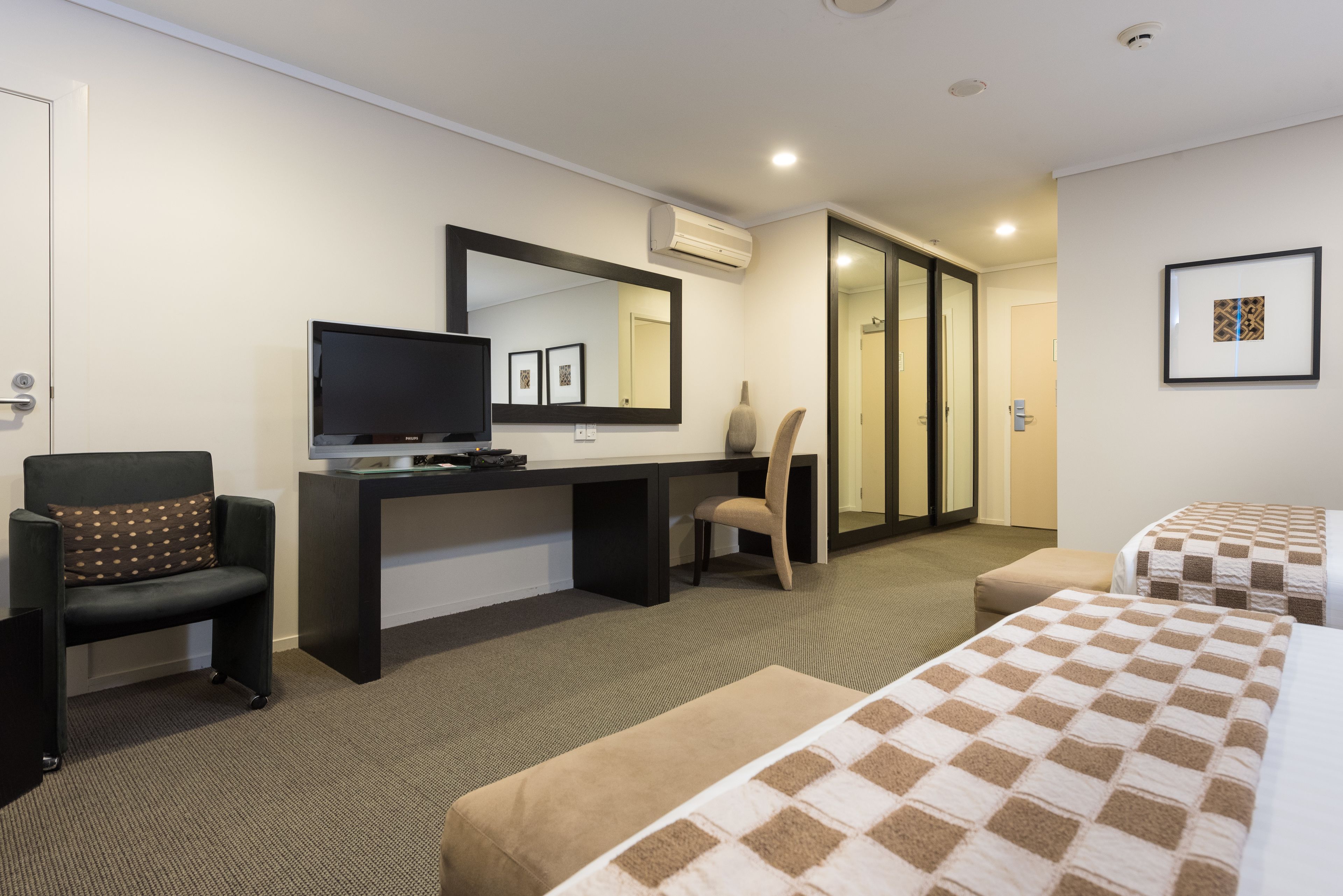 family room | 1 bedroom, desk, blackout curtains, iron/ironing board