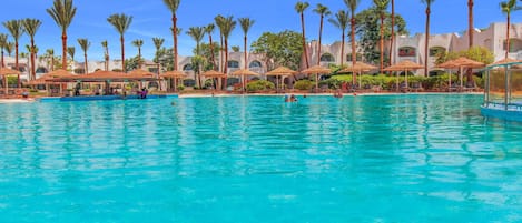 Outdoor pool, pool umbrellas, sun loungers