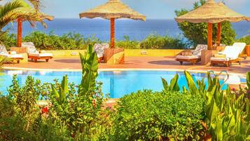 Outdoor pool, pool umbrellas, pool loungers