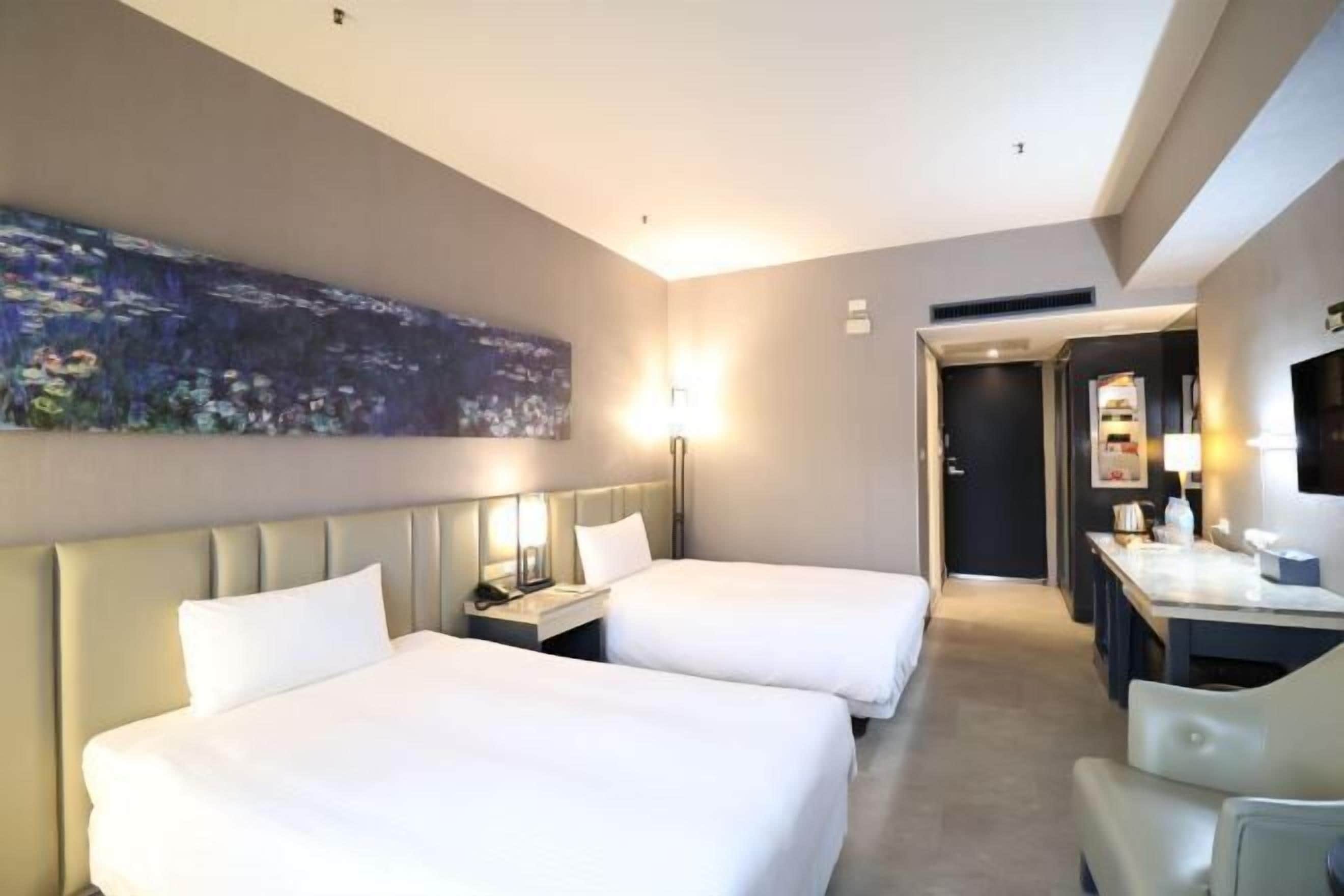 Down comforters, desk, blackout drapes, soundproofing