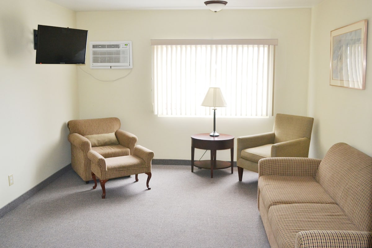 Family Suite | Living room | Flat-screen TV