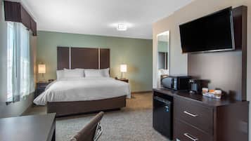 Premium bedding, desk, laptop workspace, blackout curtains