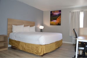 Desk, laptop workspace, blackout drapes, iron/ironing board - Travelodge by Wyndham Colorado Springs Airport/Peterson SFB (Colorado Springs)