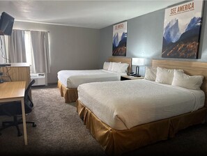Room, 2 Queen Beds, Non Smoking (Garden Level) | Desk, laptop workspace, blackout drapes, iron/ironing board - Travelodge by Wyndham Colorado Springs Airport/Peterson SFB (Colorado Springs)