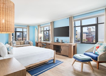 Premium Room, 1 King Bed, Corner (Spa) | Frette Italian sheets, premium bedding, down comforters, pillowtop beds at Margaritaville Hotel San Diego Gaslamp Quarter