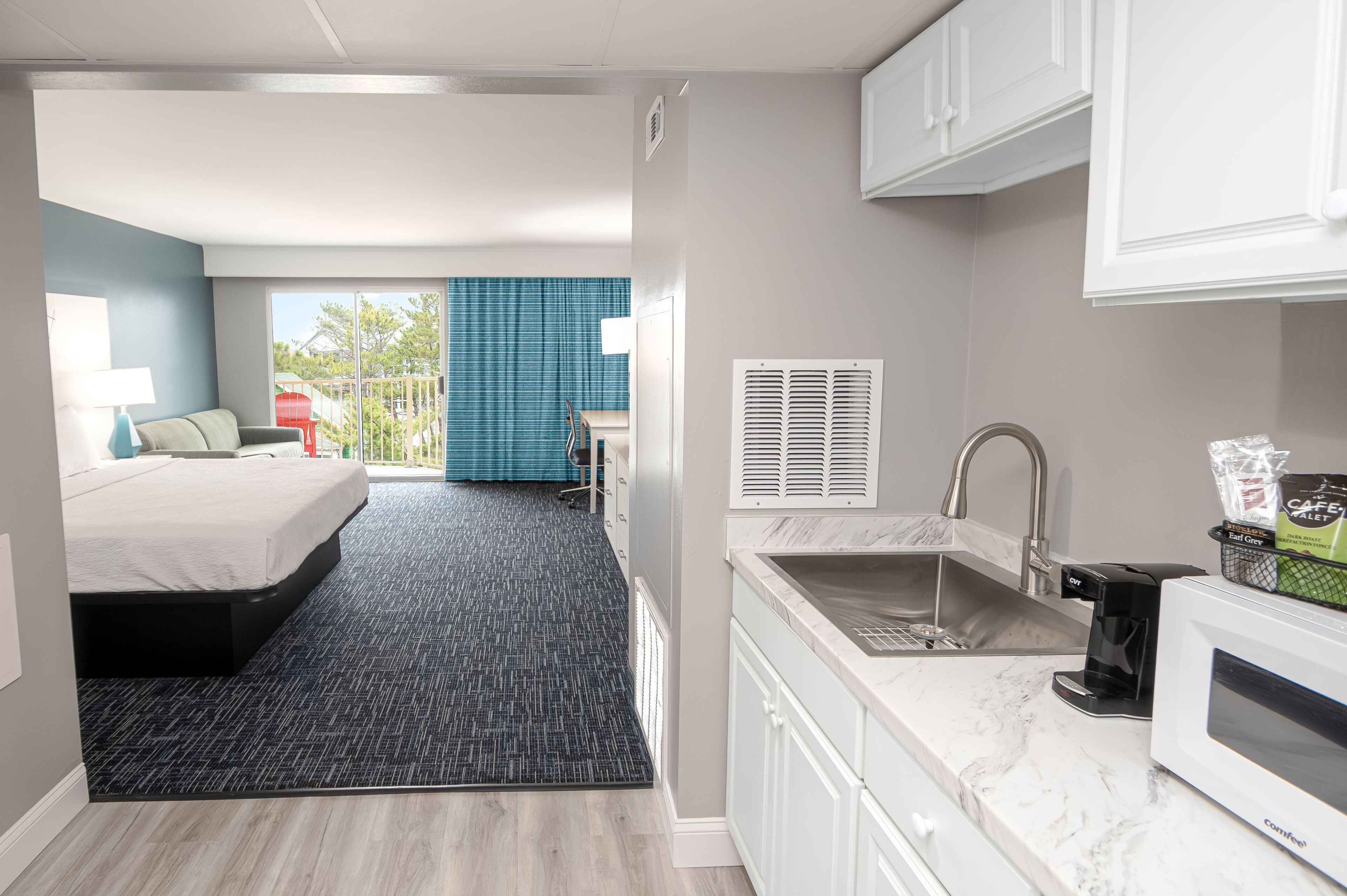 Premium bedding, blackout drapes, iron/ironing board