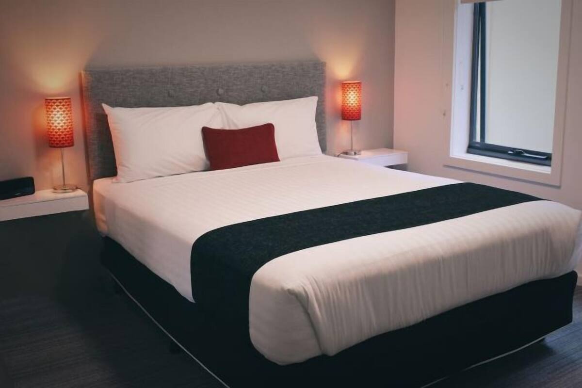 Premium bedding, individually furnished, desk, laptop workspace