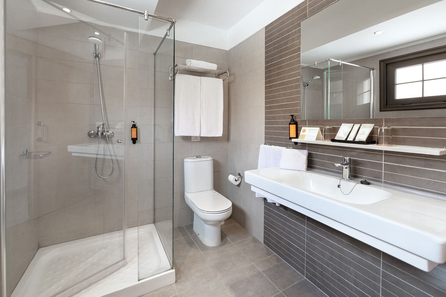 free toiletries, hair dryer, bidet, towels