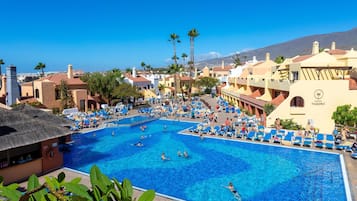 2 outdoor pools, open 9:30 AM to 6 PM, pool umbrellas, pool loungers