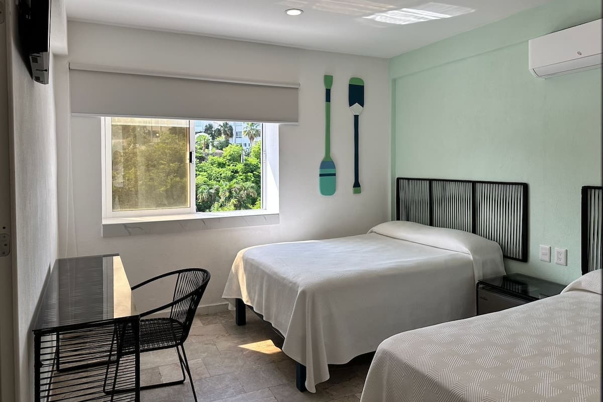 1 chambre, minibar, coffres-forts dans les chambres, draps fournis