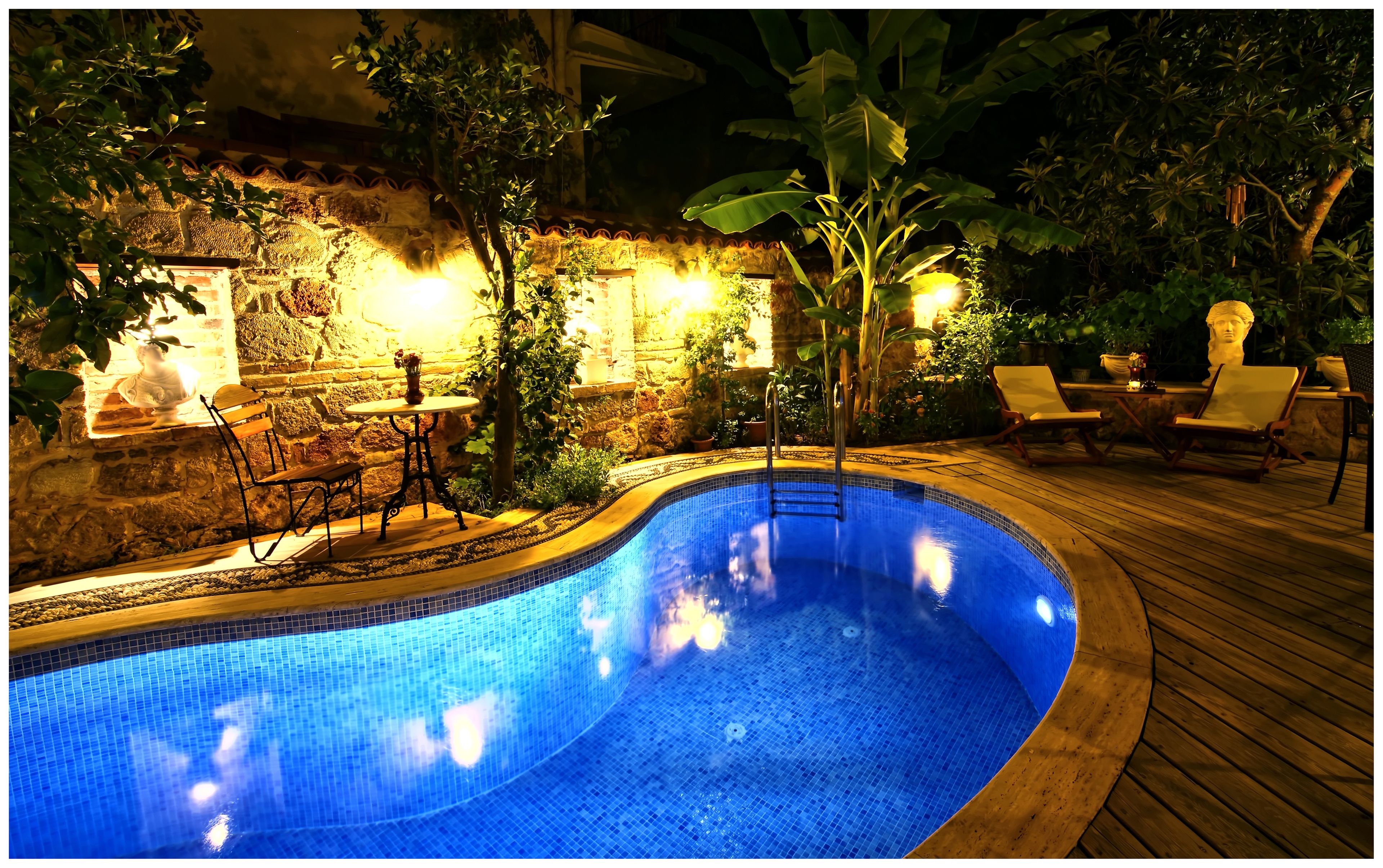 seasonal outdoor pool, pool umbrellas, pool loungers