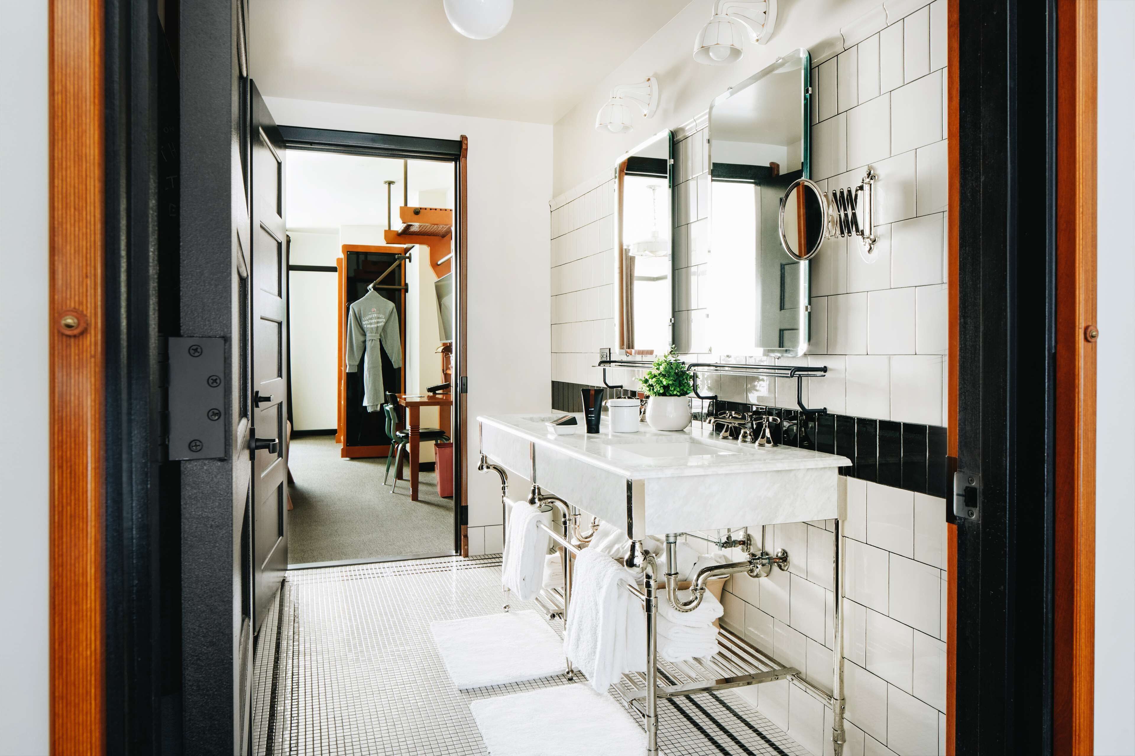 suite (bilevel) | bathroom | shower, designer toiletries, hair dryer, bathrobes