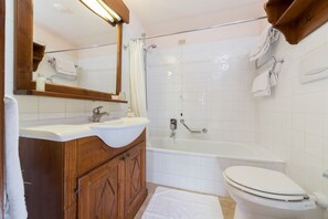 Hair dryer, bidet, towels, soap