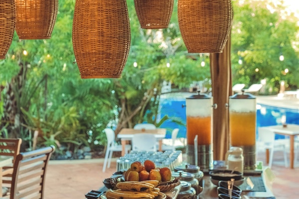 Breakfast, lunch, dinner served; international cuisine, pool views