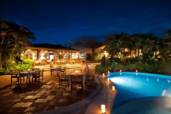 Breakfast, lunch, dinner served; international cuisine, pool views 